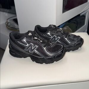 Kids New Balance Black Mesh Sneakers
